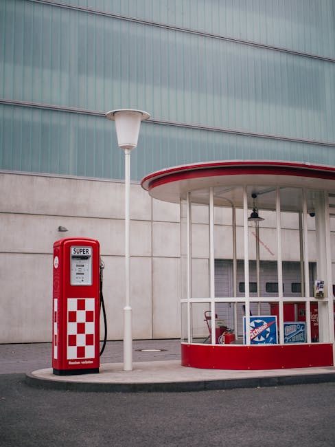 Vintage gas station facade in Frankfurt, showcasing retro architecture and design elements.